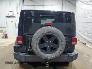2016 Jeep Wrangler Sport z VIN 1C4GJWAG1GL192158, wystawiony jako Copart lot #53303845 z przebiegiem 99 812 mil mil oraz Szkoda całkowita • Salvage title. Historia ofert i sprzedaży dostępna na DreamBid. Obrazek 6.