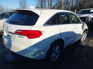 2014 Acura RDX Tech Pkg with VIN 5J8TB3H59EL006847, listed as a IAAI auction lot 41292354 with 135,300 mi miles. Bid and sale history available at carsss.com. Image 4.