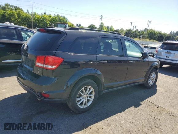 2013 Dodge Journey SXT with VIN 3C4PDDBG6DT639884, listed as a Copart auction lot 64623635 with 206,809 mi miles and Clean title. Bid and sale history available at DreamBid. Image 3.