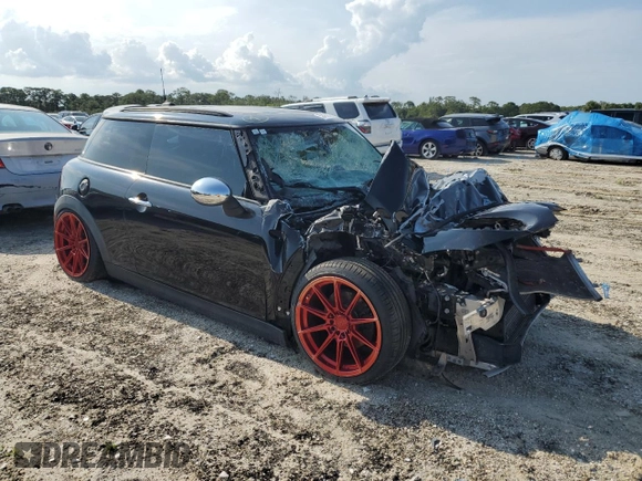 2016 MINI Hardtop S with VIN WMWXP7C58G3B49310, listed as a Copart auction lot 52460835 with 11,209 mi miles and Salvage Title. Bid and sale history available at DreamBid. Image 4.
