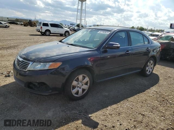 2010 Kia Optima LX z VIN KNAGG4A86A5426444, wystawiony jako Copart lot #61498275 z przebiegiem 166 526 mil mil oraz Czysty tytuł • Clean title. Historia ofert i sprzedaży dostępna na DreamBid. Obrazek 1.