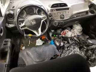 2010 Honda Fit Sport with VIN JHMGE8H42AC023154, listed as a Copart auction lot 42262615 with 104,928 mi miles and Salvage Title. Bid and sale history available at carsss.com. Image 8.