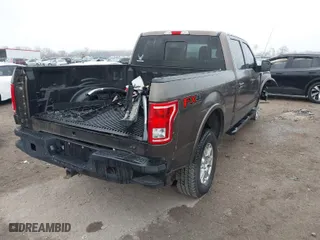 2015 Ford F-150 XLT w/HD Payload Pkg with VIN 1FTFW1EF6FFB17468, listed as a IAAI auction lot 41543094 with 208,909 mi miles. Bid and sale history available at carsss.com. Image 4.
