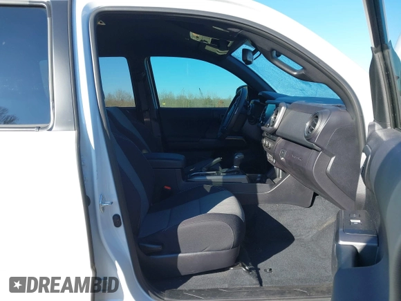 2021 Toyota Tacoma 4WD SR5 with VIN 3TYDZ5BN3MT001860, listed as a IAAI auction lot 41269423 with 23,378 mi miles. Bid and sale history available at carsss.com. Image 5.