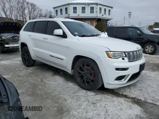 2019 Jeep Grand Cherokee Summit with VIN 1C4RJFJT7KC625240, listed as a Copart auction lot 44710265 with 114,205 mi miles and Salvage title. Bid and sale history available at DreamBid. Image 4.