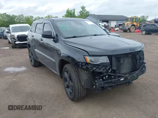 2016 Jeep Grand Cherokee Overland z VIN 1C4RJFCT2GC418176, wystawiony jako IAAI lot #42237631 z przebiegiem 141 257 mil mil oraz . Historia ofert i sprzedaży dostępna na DreamBid. Obrazek 1.