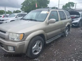 2002 Infiniti QX4 Luxury z VIN JNRDR09Y92W255357, wystawiony jako IAAI lot #42166968 z przebiegiem 169 448 mil mil oraz . Historia ofert i sprzedaży dostępna na DreamBid. Obrazek 2.