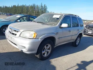 2006 Mazda Tribute S with VIN 4F2YZ04156KM33788, listed as a IAAI auction lot 42046827 with 121,057 mi miles and . Bid and sale history available at carsss.com. Image 2.