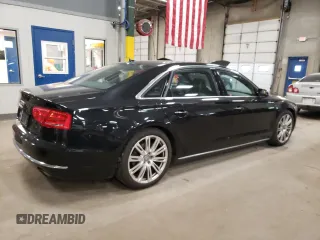 2014 Audi A8 3.0T z VIN WAURGAFD1EN009932, wystawiony jako Copart lot #84607914 z przebiegiem 87 981 mil mil oraz Szkoda całkowita • Salvage title. Historia ofert i sprzedaży dostępna na DreamBid. Obrazek 3.