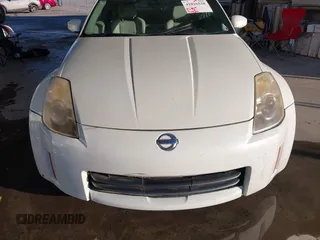 2006 Nissan 350Z Touring z VIN JN1AZ34D86M307042, wystawiony jako IAAI lot #41016528 z przebiegiem 124 303 mil mil oraz . Historia ofert i sprzedaży dostępna na DreamBid. Obrazek 6.
