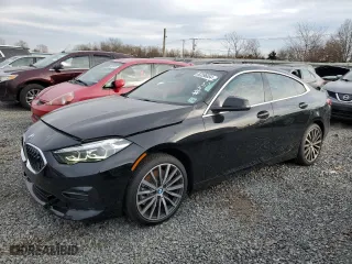 2023 BMW 2 Series 228i xDrive with VIN WBA73AK06P7M83274, listed as a Copart auction lot 82286654 with 27,624 mi miles and Salvage Title. Bid and sale history available at carsss.com. Image 1.