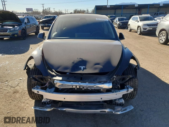 2022 Tesla Model Y Performance with VIN 7SAYGDEF3NF446769, listed as a Copart auction lot 83702074 with 32,895 mi miles and Salvage title. Bid and sale history available at DreamBid. Image 5.