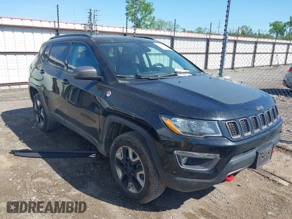 2018 Jeep Compass Trailhawk z VIN 3C4NJDDBXJT238593, wystawiony jako IAAI lot #42075447 z przebiegiem 122 064 mil mil oraz . Historia ofert i sprzedaży dostępna na DreamBid. Obrazek 1.