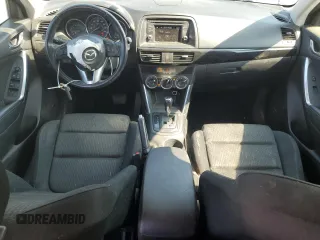 2014 Mazda CX-5 Touring with VIN JM3KE4CY6E0375084, listed as a Copart auction lot 46344065 with 143,828 mi miles and Salvage Title. Bid and sale history available at carsss.com. Image 8.