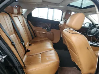 2014 Jaguar XJ Portfolio with VIN SAJWJ2GD5E8V69982, listed as a Copart auction lot 58933515 with 92,847 mi miles and Salvage title. Bid and sale history available at DreamBid. Image 10.