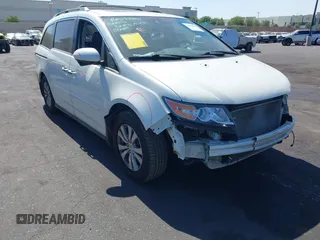 2014 Honda Odyssey EX-L with VIN 5FNRL5H61EB032601, listed as a IAAI auction lot 42654865 with 63,293 mi miles and . Bid and sale history available at DreamBid. Image 1.