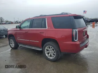 2015 GMC Yukon SLT z VIN 1GKS2BKC6FR154565, wystawiony jako Copart lot #50881225 z przebiegiem 160 669 mil mil oraz Szkoda całkowita • Salvage title. Historia ofert i sprzedaży dostępna na DreamBid. Obrazek 2.