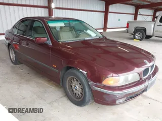 1997 BMW 5 Series 528iA with VIN WBADD6323VBW15656, listed as a IAAI auction lot 41777667 with 142,443 mi miles. Bid and sale history available at carsss.com. Image 1.