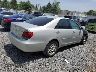 2006 Toyota Camry LE z VIN 4T1BF30K16U630147, wystawiony jako Copart lot #59696815 z przebiegiem 168 727 mil mil oraz Czysty tytuł • Clean title. Historia ofert i sprzedaży dostępna na DreamBid. Obrazek 3.