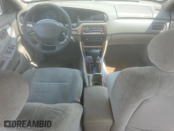 2001 Nissan Altima GXE z VIN 1N4DL01D41C189073, wystawiony jako Copart lot #60073955 z przebiegiem 153 907 mil mil oraz Szkoda całkowita • Salvage title. Historia ofert i sprzedaży dostępna na DreamBid. Obrazek 8.