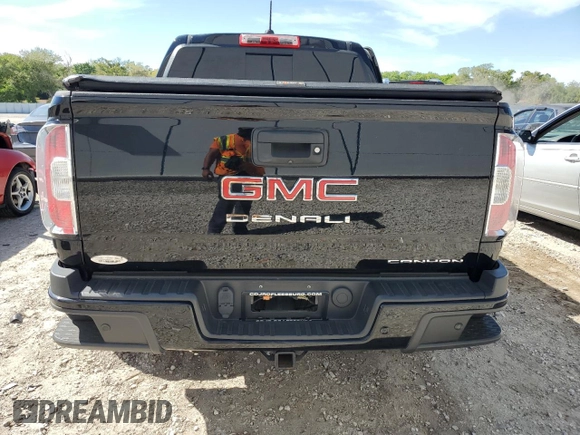 2021 GMC Canyon 2WD Denali with VIN 1GTG5EEN9M1171878, listed as a Copart auction lot 45887114 with 44,741 mi miles and Non Repairable. Bid and sale history available at carsss.com. Image 6.