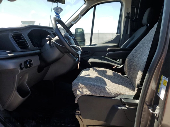 2020 Ford Transit z VIN 1FTYE2C83LKA21094, wystawiony jako Copart lot #51489834 z przebiegiem 116 934 mil mil oraz Szkoda całkowita • Salvage title. Historia ofert i sprzedaży dostępna na DreamBid. Obrazek 7.