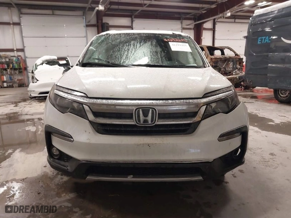 2021 Honda Pilot EX-L with VIN 5FNYF5H57MB040081, listed as a IAAI auction lot 41292215 with 72,639 mi miles. Bid and sale history available at carsss.com. Image 12.