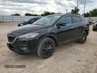 2015 Mazda CX-9 Grand Touring z VIN JM3TB2DA3F0452322, wystawiony jako Copart lot #57821285 z przebiegiem 147 610 mil mil oraz Czysty tytuł • Clean title. Historia ofert i sprzedaży dostępna na DreamBid. Obrazek 1.