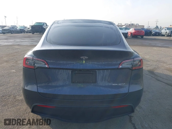 2023 Tesla Model Y Long Range with VIN 7SAYGDEE7PA196038, listed as a IAAI auction lot 41459601 with 16,489 mi miles and . Bid and sale history available at DreamBid. Image 16.