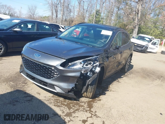 2020 Ford Escape Titanium Hybrid z VIN 1FMCU0DZ7LUB57978, wystawiony jako IAAI lot #41570242 z przebiegiem 32 819 mil mil oraz . Historia ofert i sprzedaży dostępna na DreamBid. Obrazek 18.