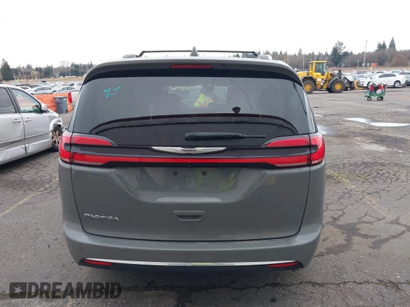 2021 Chrysler Pacifica Touring L with VIN 2C4RC1BG0MR543634, listed as a IAAI auction lot 41513467 with 148,010 mi miles and . Bid and sale history available at DreamBid. Image 16.