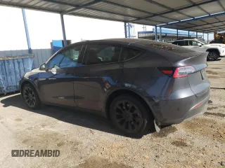 2024 Tesla Model Y Long Range with VIN 7SAYGDEE4RF127409, listed as a Copart auction lot 84274794 with 14,246 mi miles and Salvage title. Bid and sale history available at DreamBid. Image 2.