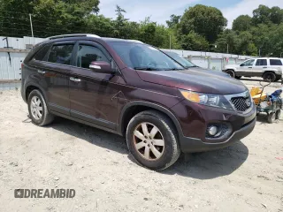 2012 Kia Sorento LX with VIN 5XYKT3A64CG194955, listed as a Copart auction lot 59443524 with 185,185 mi miles and Salvage Title. Bid and sale history available at DreamBid. Image 4.