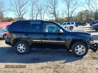 2005 GMC Envoy SLE with VIN 1GKDS13S152246568, listed as a IAAI auction lot 41293887 with 315,882 mi miles and . Bid and sale history available at DreamBid. Image 13.