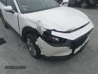 2021 Mazda CX-30 Premium with VIN 3MVDMADL5MM318729, listed as a IAAI auction lot 41645560 with 51,132 mi miles and . Bid and sale history available at DreamBid. Image 6.