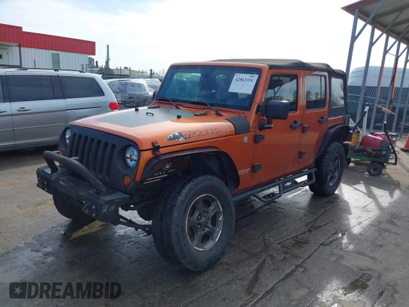 2010 Jeep Wrangler Unlimited Sport with VIN 1J4HA3H1XAL189667, listed as a IAAI auction lot 42062351 with 144,838 mi miles. Bid and sale history available at carsss.com. Image 2.