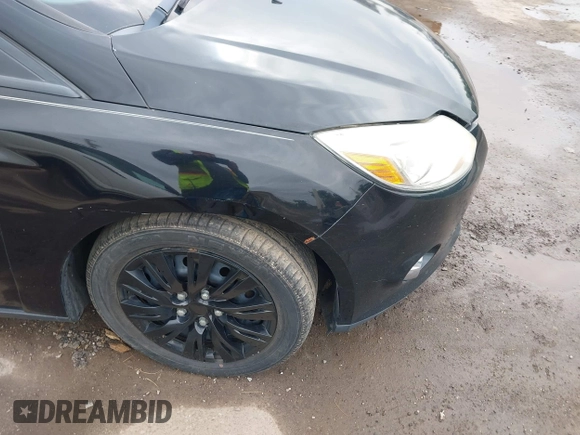 2012 Ford Focus SE with VIN 1FAHP3F22CL249739, listed as a IAAI auction lot 42538870 with 171,975 mi miles and . Bid and sale history available at DreamBid. Image 6.