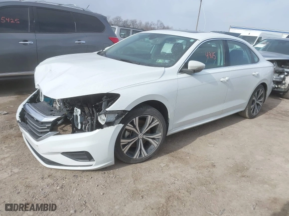 2021 Volkswagen Passat 2.0T SE with VIN 1VWSA7A35MC006675, listed as a IAAI auction lot 41634815 with 85,746 mi miles. Bid and sale history available at carsss.com. Image 2.