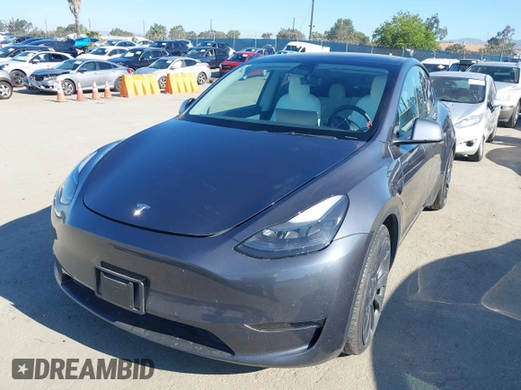 2022 Tesla Model Y Performance z VIN 7SAYGDEF2NF490794, wystawiony jako IAAI lot #42218742 z przebiegiem 41 402 mil mil oraz . Historia ofert i sprzedaży dostępna na DreamBid. Obrazek 19.