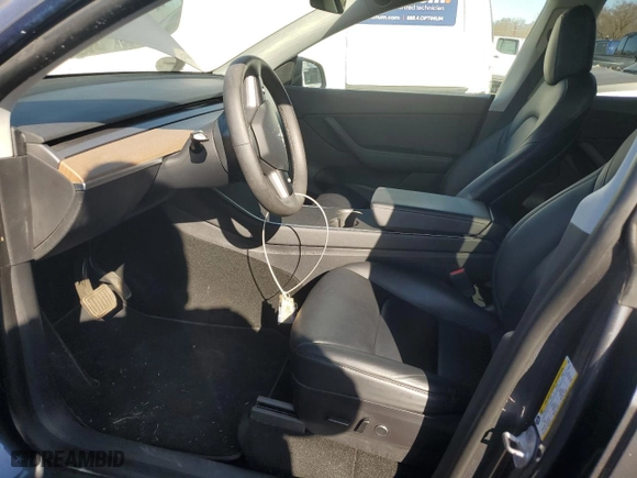 2021 Tesla Model Y Standard Range with VIN 5YJYGDED8MF115065, listed as a Copart auction lot 49420235 with 111,018 mi miles and Salvage Title. Bid and sale history available at carsss.com. Image 7.