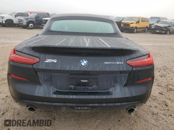 2022 BMW Z4 sDrive30i with VIN WBAHF3C04NWX42062, listed as a Copart auction lot 84463034 with 0 mi miles and Salvage Title. Bid and sale history available at carsss.com. Image 10.