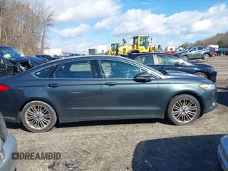 2015 Ford Fusion SE with VIN 3FA6P0H92FR100897, listed as a IAAI auction lot 41870271 with 195,182 mi miles and . Bid and sale history available at DreamBid. Image 13.