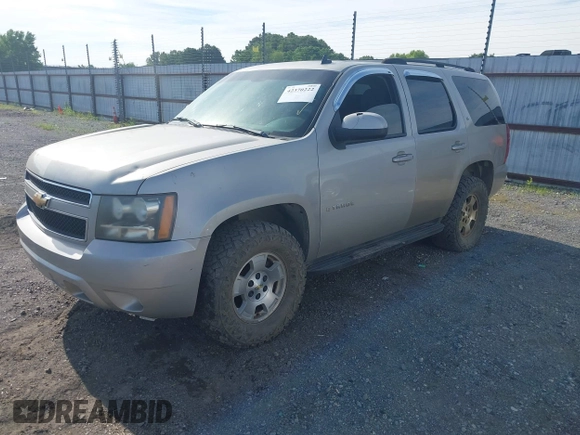 2007 Chevrolet Tahoe LT with VIN 1GNFK13087R165703, listed as a IAAI auction lot 42370222 with 150,014 mi miles and . Bid and sale history available at DreamBid. Image 2.