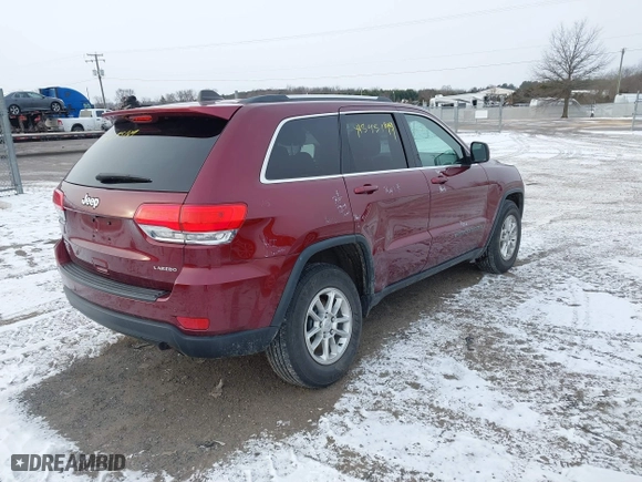 2018 Jeep Grand Cherokee Laredo E with VIN 1C4RJFAG9JC504596, listed as a IAAI auction lot 41595149 with 93,713 mi miles. Bid and sale history available at carsss.com. Image 4.