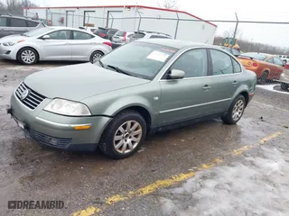 2003 Volkswagen Passat GLS with VIN WVWPD63B33E022262, listed as a IAAI auction lot 41466620 with 249,726 mi miles. Bid and sale history available at carsss.com. Image 2.
