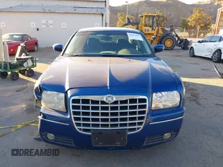 2009 Chrysler 300 Touring with VIN 2C3LA53V89H565270, listed as a IAAI auction lot 41069505 with 112,830 mi miles. Bid and sale history available at carsss.com. Image 12.