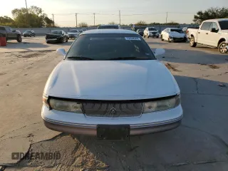 1994 Chrysler LHS z VIN 2C3ED56F7RH682200, wystawiony jako Copart lot #75204544 z przebiegiem 90 694 mil mil oraz Tytuł czysty. Historia ofert i sprzedaży dostępna na DreamBid. Obrazek 5.