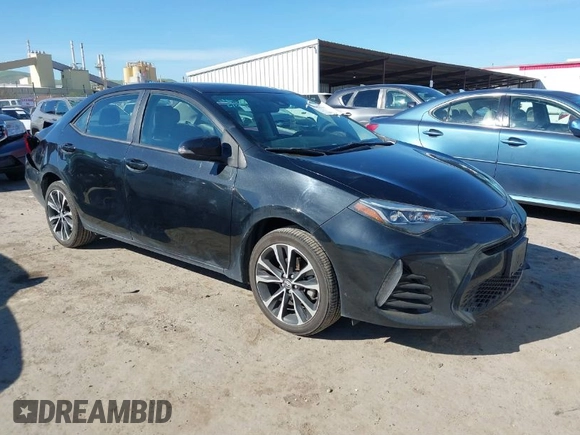 2019 Toyota Corolla L z VIN 5YFBURHE7KP857880, wystawiony jako IAAI lot #41850987 z przebiegiem 117 823 mil mil oraz . Historia ofert i sprzedaży dostępna na DreamBid. Obrazek 1.