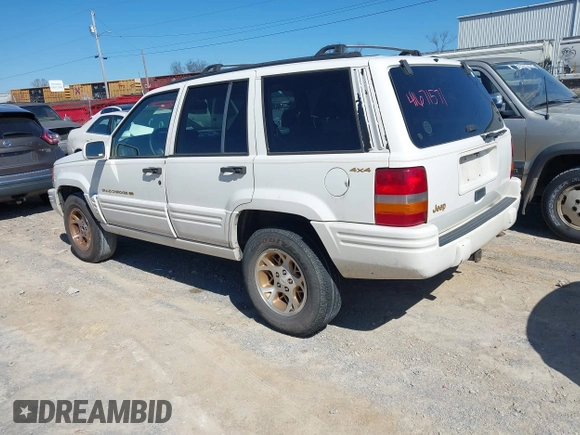 1997 Jeep Grand Cherokee Limited with VIN 1J4GZ78S9VC667698, listed as a IAAI auction lot 41671571 with 191,448 mi miles and . Bid and sale history available at DreamBid. Image 3.