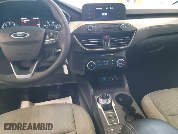 2021 Ford Escape S with VIN 1FMCU0F6XMUA97053, listed as a IAAI auction lot 42722823 with 34,859 mi miles and . Bid and sale history available at DreamBid. Image 8.